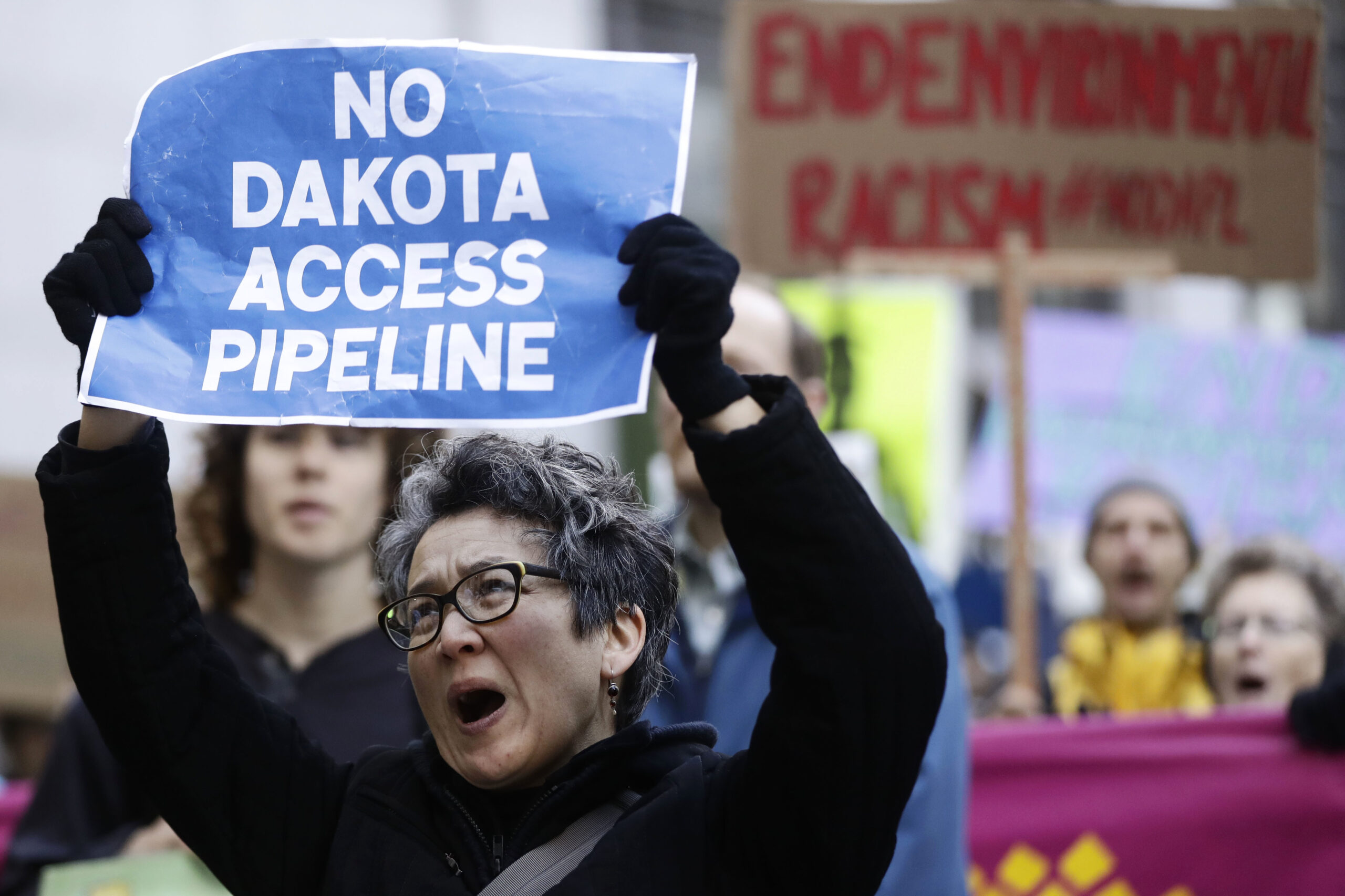 Protesters demonstrate in solidarity with members of the Standing Rock Sioux tribe in North Dakota over the construction of the Dakota Access oil pipeline in Philadelphia, Thursday, Dec. 1, 2016. (AP Photo/Matt Rourke) (AP)