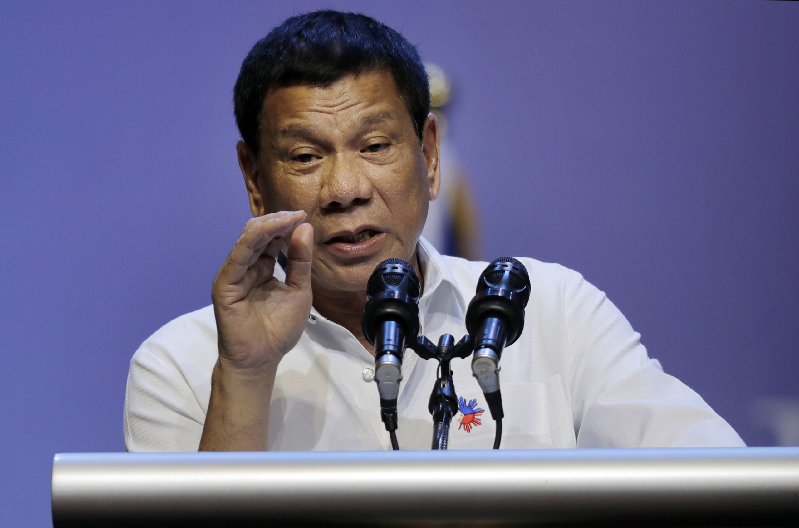 Philippine President Rodrigo Duterte speaks to the Filipino community in Singapore on Friday, Dec. 16, 2016. (AP Photo/Wong Maye-E) (AP Photo/Wong Maye-E)