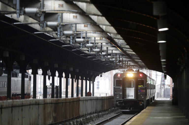 In a photograph taken Wednesday, Nov. 30, 2016, a New Jersey Transit train approaches the Hoboken Train Terminal on Track 4 in Hoboken, N.J. (AP Photo/Julio Cortez) (AP Photo/Julio Cortez)