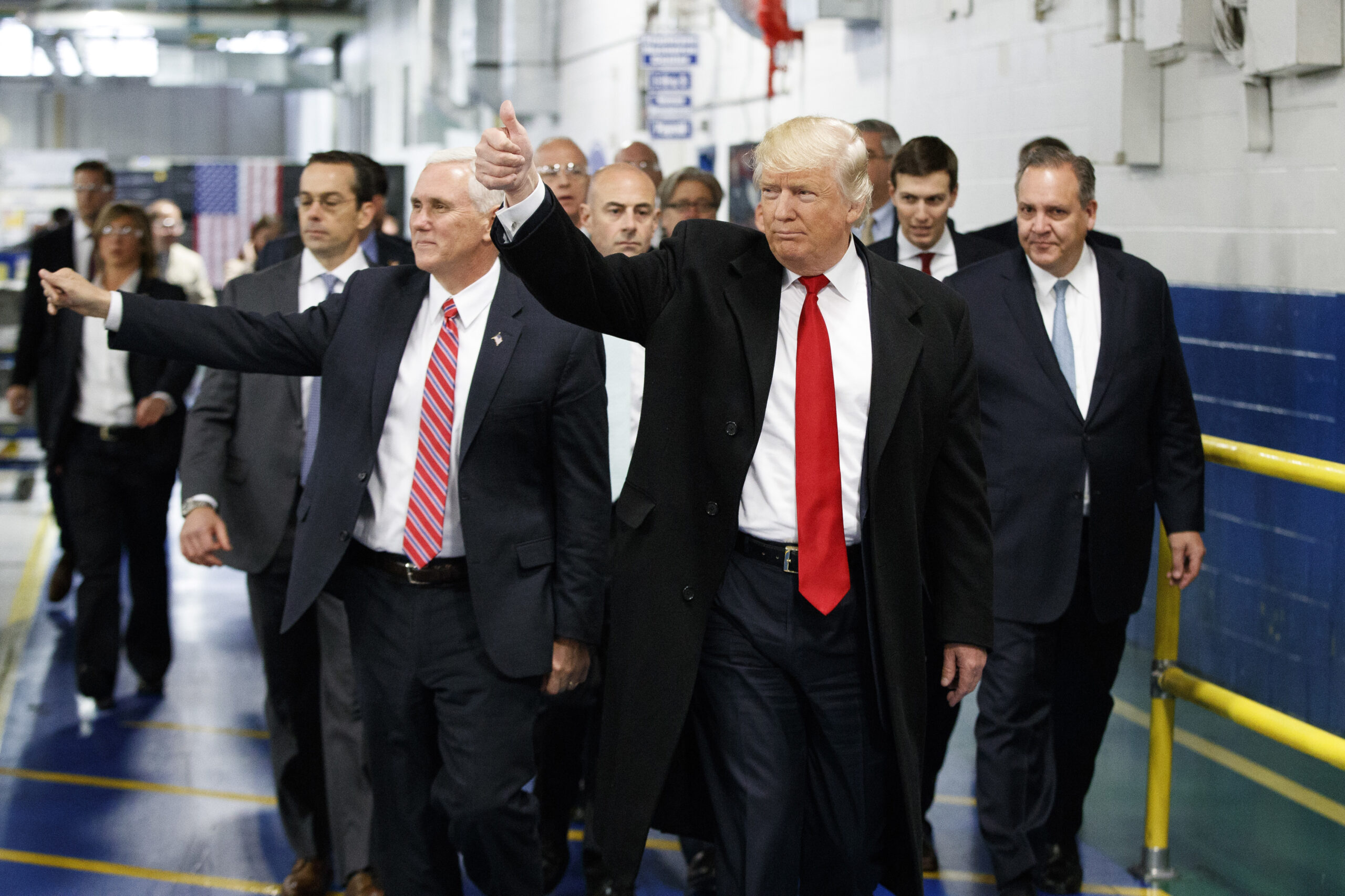 FILE - In this Thursday, Dec. 1, 2016 file photo, President-elect Donald Trump and Vice President-elect Mike Pence wave as they visit to Carrier factory, in Indianapolis, Ind. Trump is slamming a union leader who criticized his deal to discourage air conditioner manufacturer Carrier Corp. from closing an Indiana factory and moving its jobs to Mexico. Trump tweeted Wednesday evening, Dec. 7, 2016: "Chuck Jones, who is President of United Steelworkers 1999, has done a terrible job representing workers." (AP Photo/Evan Vucci, File)