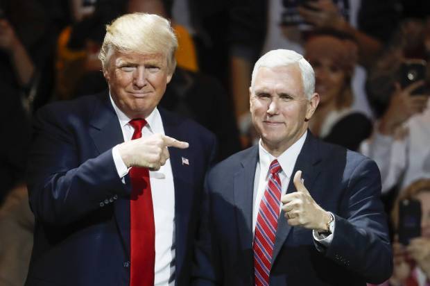 President-elect Donald Trump, left, and Vice President-elect Mike Pence (AP Photo/John Minchillo)