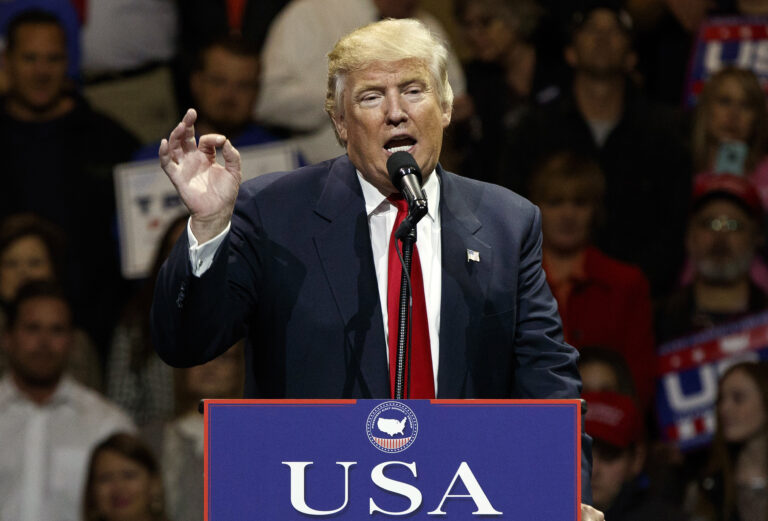 FILE - In this Dec. 1, 2016, photo, President-elect Donald Trump gestures as he speaks during a "USA Thank You" tour event in Cincinnati. Russia’s government staunchly denies reports that it tampered in the U.S. election or supported either candidate, but once the results were in, members of President Vladimir Putin’s United Russia party didn’t hold back. (AP Photo/Evan Vucci) (AP)