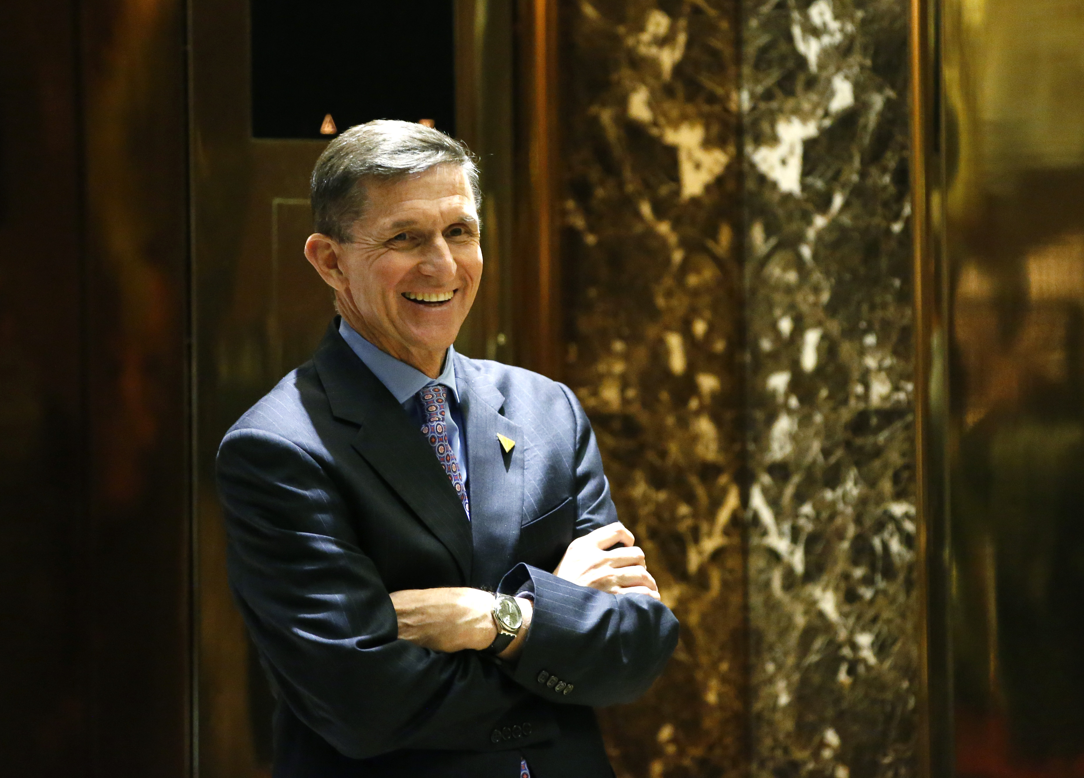 President-elect Donald J. Trump's choice for National Security Advisor, Michael T. Flynn, waits for an elevator at Trump Tower, Monday, Dec. 12, 2016, in New York. (AP Photo/Kathy Willens) (AP)