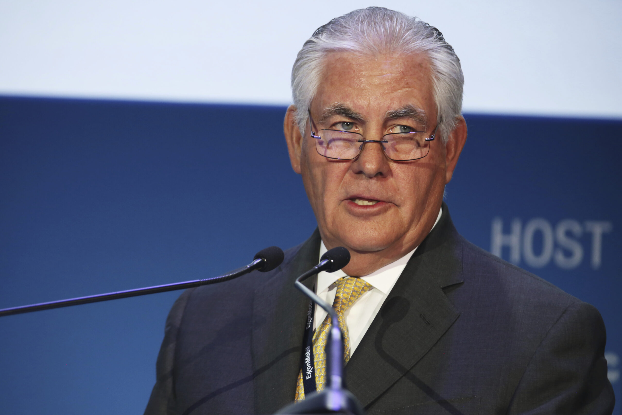 FILE - In this Nov. 7, 2016, file photo, ExxonMobil CEO and chairman Rex W. Tillerson gives a speech at the annual Abu Dhabi International Petroleum Exhibition & Conference in Abu Dhabi, United Arab Emirates. Throughout the presidential campaign, the Bush family and many of its Republican allies turned their backs on Donald Trump. Now, they’re finding common cause with Trump over his pick to lead the State Department: Tillerson, who has long orbited their same political, philanthropic and business circles. (AP Photo/Jon Gambrell, File) (AP)
