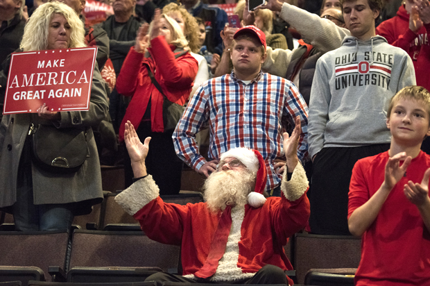 CINCINNATI, OH - DECEMBER 01: Guests listen to President-elect Donald Trump speak at U.S. Bank Arena on December 1, 2016 in Cincinnati, Ohio. Trump took time off from selecting the cabinet for his incoming administration to celebrate his victory in the general election.  (Photo by Ty Wright/Getty Images) (Getty Images)