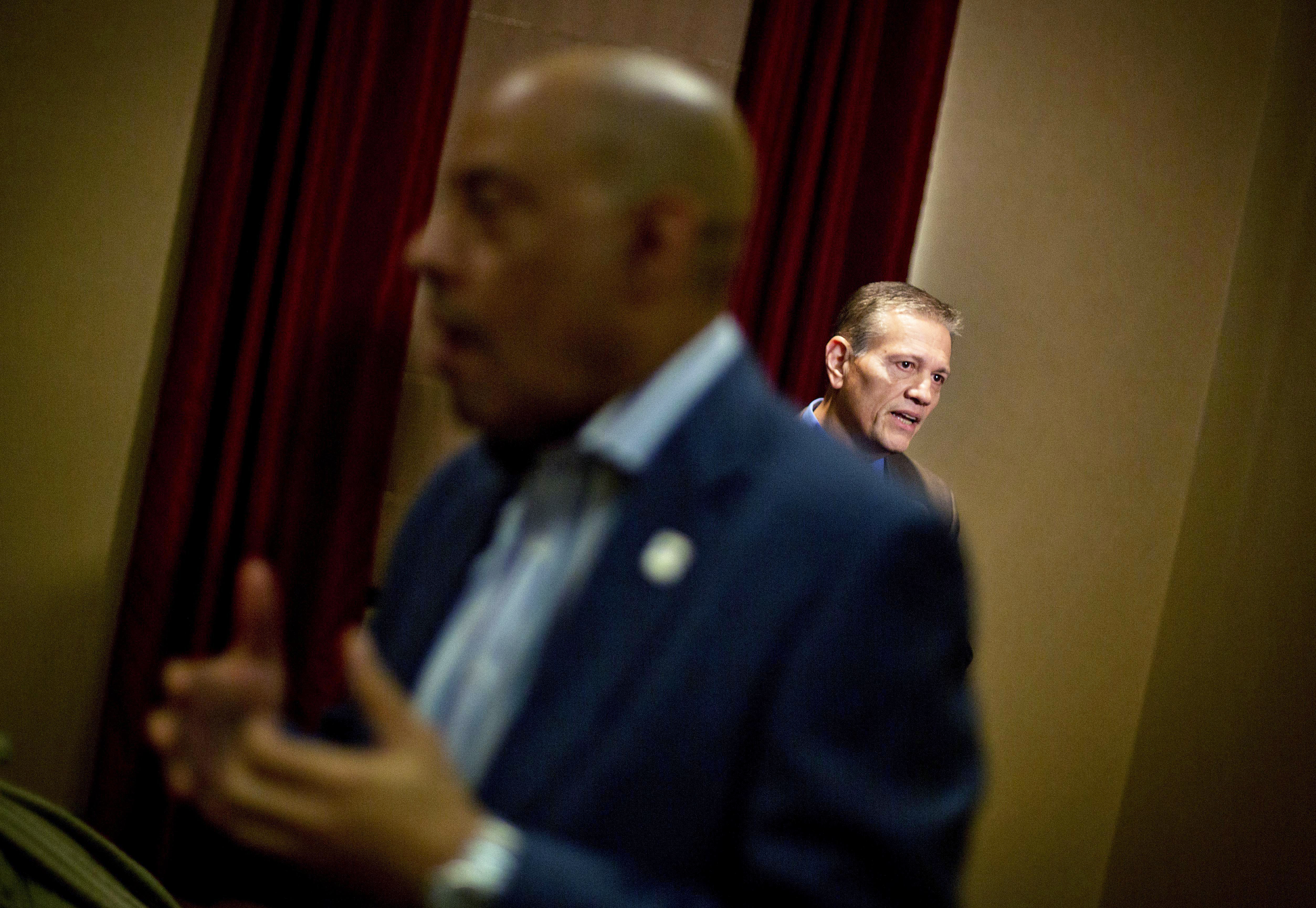 LaGrange Public Safety Chief Lou Dekmar, right, talks to reporters following a 2015 meeting of law enforcement agencies to discuss best practices when investigating officer-involved shootings. (AP Photo/David Goldman)