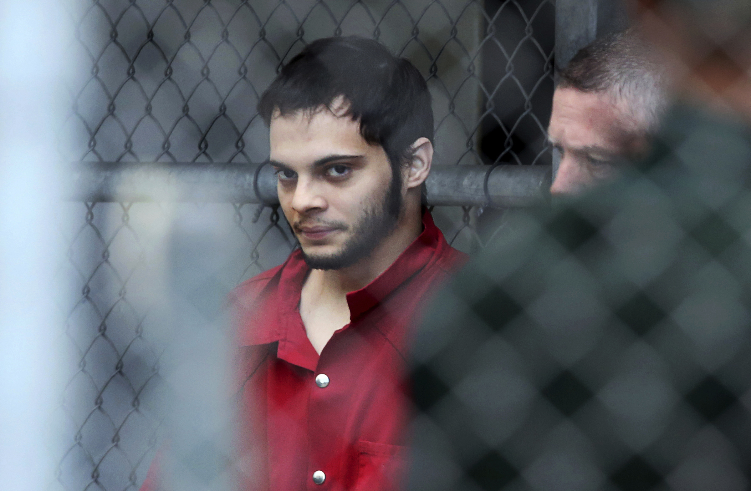 Esteban Santiago is taken from the Broward County main jail as he is transported to the federal courthouse in Fort Lauderdale, Fla., on Monday, Jan. 9, 2017. Santiago is accused of fatally shooting several people at a crowded Florida airport baggage claim and faces airport violence and firearms charges that could mean the death penalty if he's convicted. (Amy Beth Bennett/South Florida Sun-Sentinel via AP) (AP)