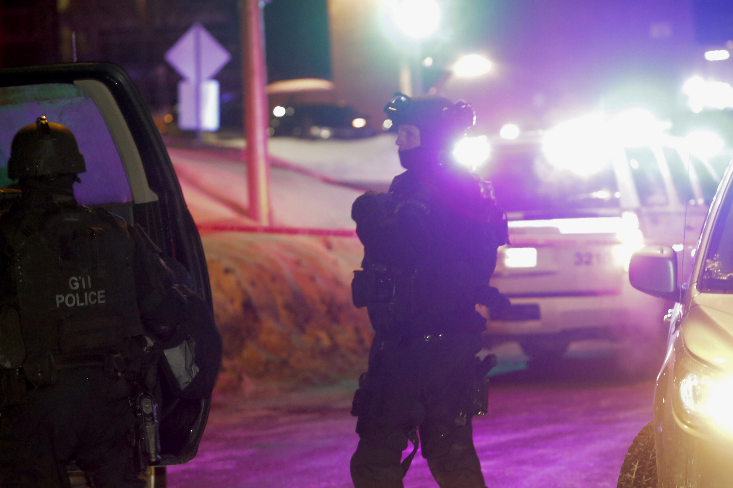 Police survey the scene after a deadly shooting at a mosque in Quebec City, Canada, Sunday, Jan. 29, 2017. Quebec Premier Philippe Couillard termed the act "barbaric violence" and expressed solidarity with victims' families. (Francis Vachon/The Canadian Press via AP) (AP)