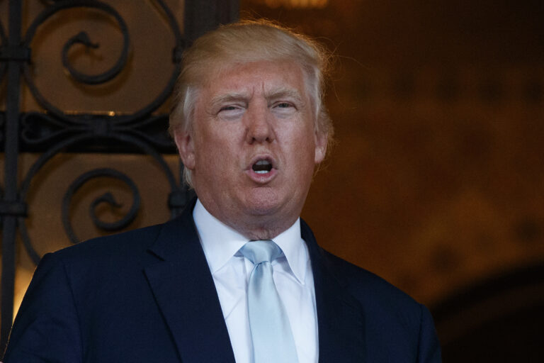 FILE - In this Dec. 28, 2016 file photo, President-elect Donald Trump speaks to reporters at Mar-a-Lago in Palm Beach, Fla. For almost eight years, the members of the Congressional Black Caucus existed in the shadow of the first black president, simultaneously praising President Barack Obama’s achievements while pushing him to do more for their constituents who overwhelmingly supported his history-making campaign and administration. (AP Photo/Evan Vucci, File) (AP)