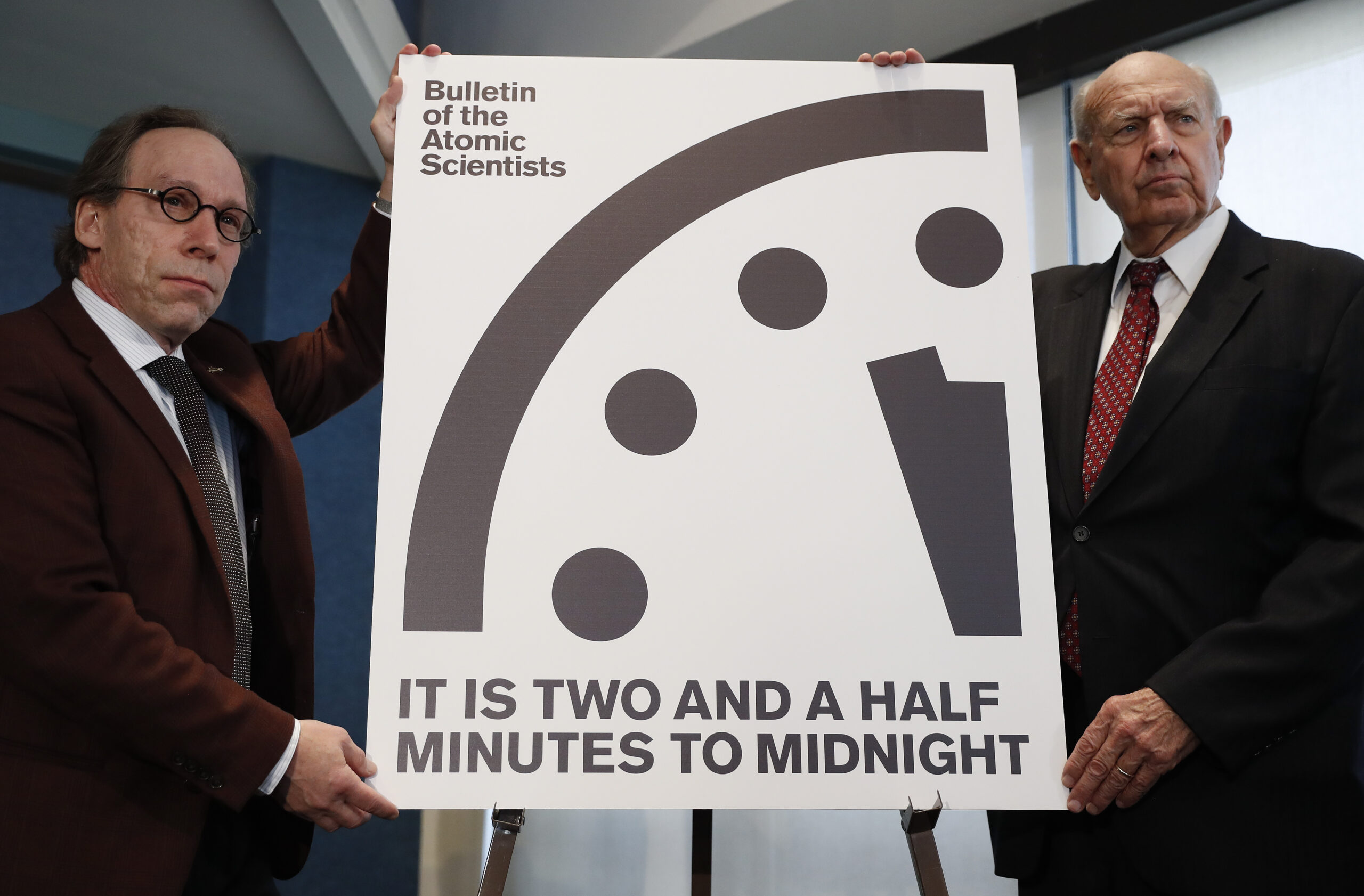 Lawrence Krauss, theoretical physicist, chair of the Bulletin of the Atomic Scientists Board of Sponsors, left, and Thomas Pickering, co-chair of the International Crisis Group, display the Doomsday Clock during a news conference the at the National Press Club in Washington, Thursday, Jan. 26, 2017, announcing that the Bulletin of the Atomic Scientist have moved the minute hand of the Doomsday Clock to two and a half minutes to midnight. (AP Photo/Carolyn Kaster) (AP)
