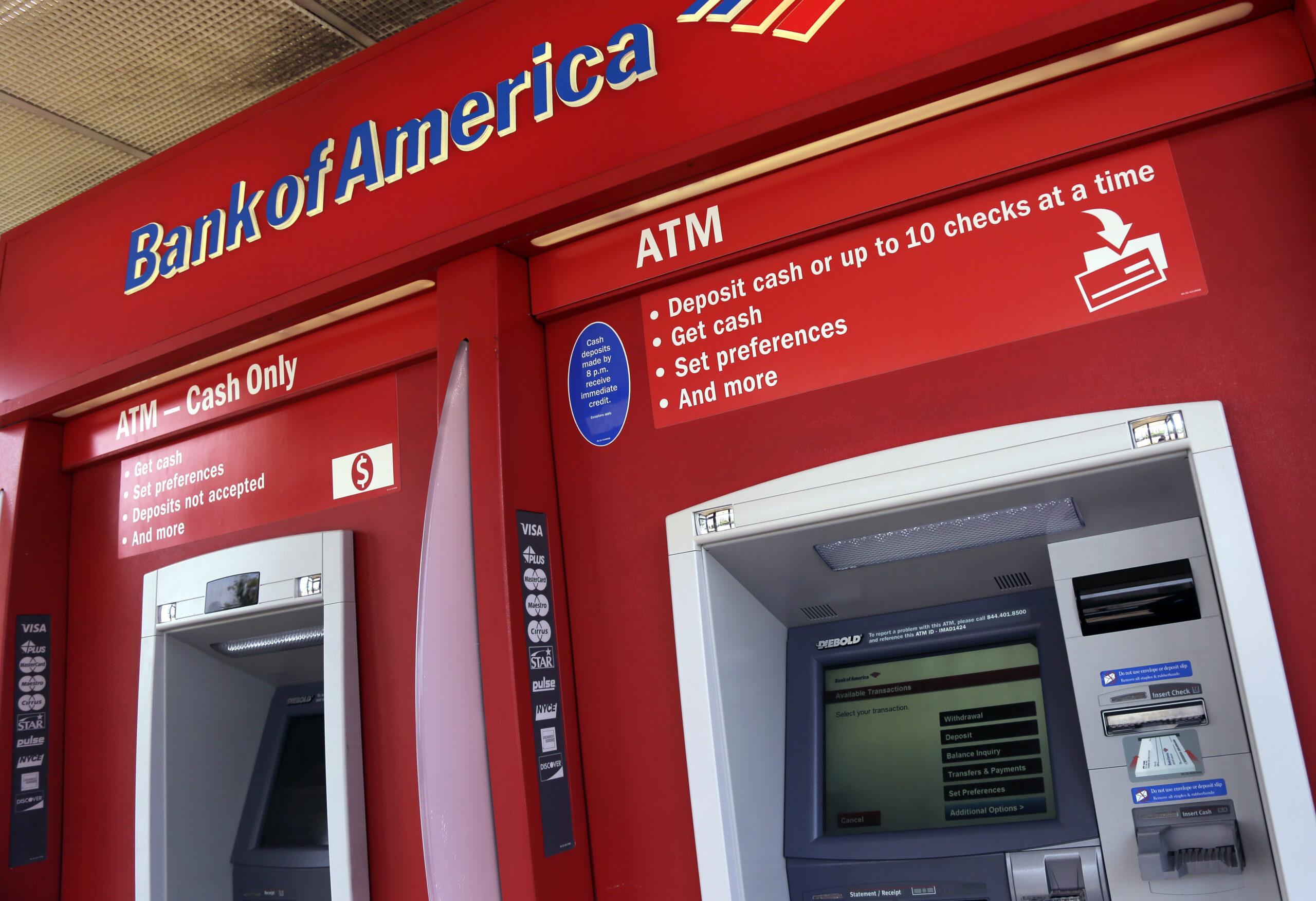 This Monday, July 18, 2016, photo shows a Bank of America ATM in Woburn, Mass. On Friday, Jan. 13, 2017, Bank of America Corp. reports financial results. (AP Photo/Elise Amendola) (AP)