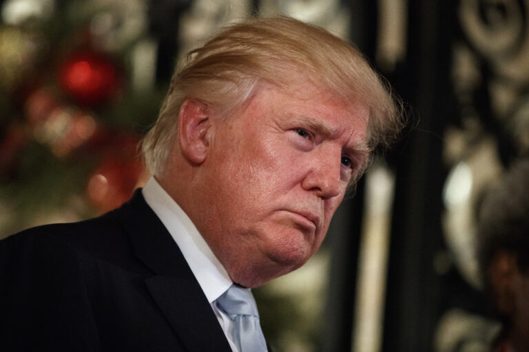 FILE -- In this Wednesday, Dec. 28, 2016 file photo, President-elect Donald Trump listens to a question as he speaks to reporters at Mar-a-Lago, in Palm Beach, Fla. The 18-hole golf course in Dubai bearing Donald Trump’s name exemplifies the questions surrounding his international business interests. The course will open in February 2017 in the United Arab Emirates, but concerns about security, financial agreements and other matters have yet to be answered by the incoming 45th American president. (AP Photo/Evan Vucci, File) (AP)