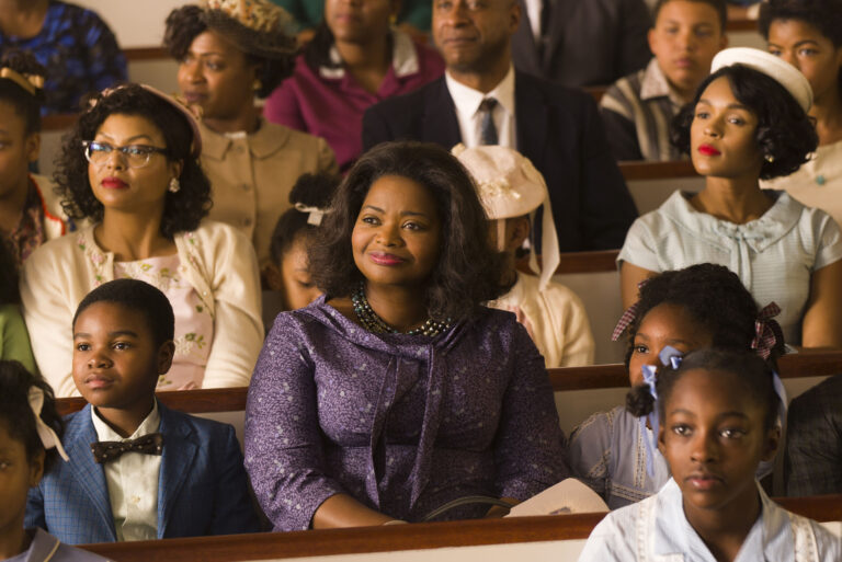 This image released by Twentieth Century Fox shows Taraji P. Henson, background left, Octavia Spencer, center, and Janelle Monae, background right, in a scene from "Hidden Figures." (Hopper Stone/Twentieth Century Fox via AP) (AP)