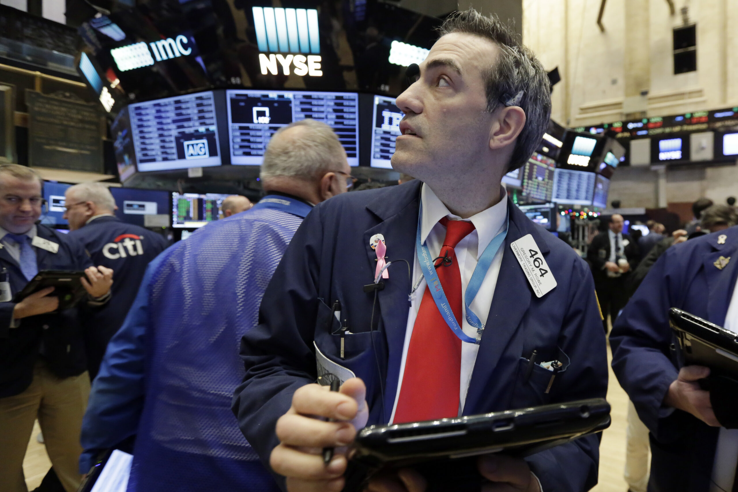 Trader Gregory Rowe works on the floor of the New York Stock Exchange, Tuesday, Jan. 3, 2017. The stock market opened the year on a strong note, led by big gains in banks and energy companies. (AP Photo/Richard Drew)) (AP)