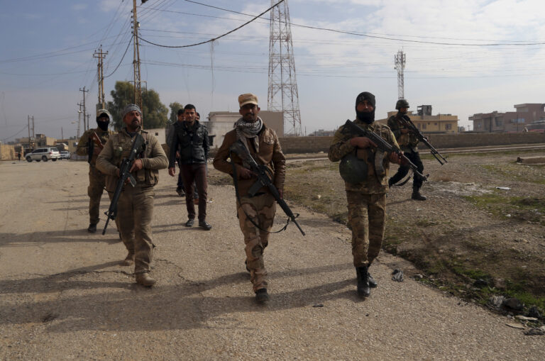 Iraqi security forces patrol in an area recently liberated from Islamic State in the predominantly Christian town of Tilkaif, Iraq, Saturday, Jan. 21, 2017. (AP Photo/Khalid Mohammed) (AP)