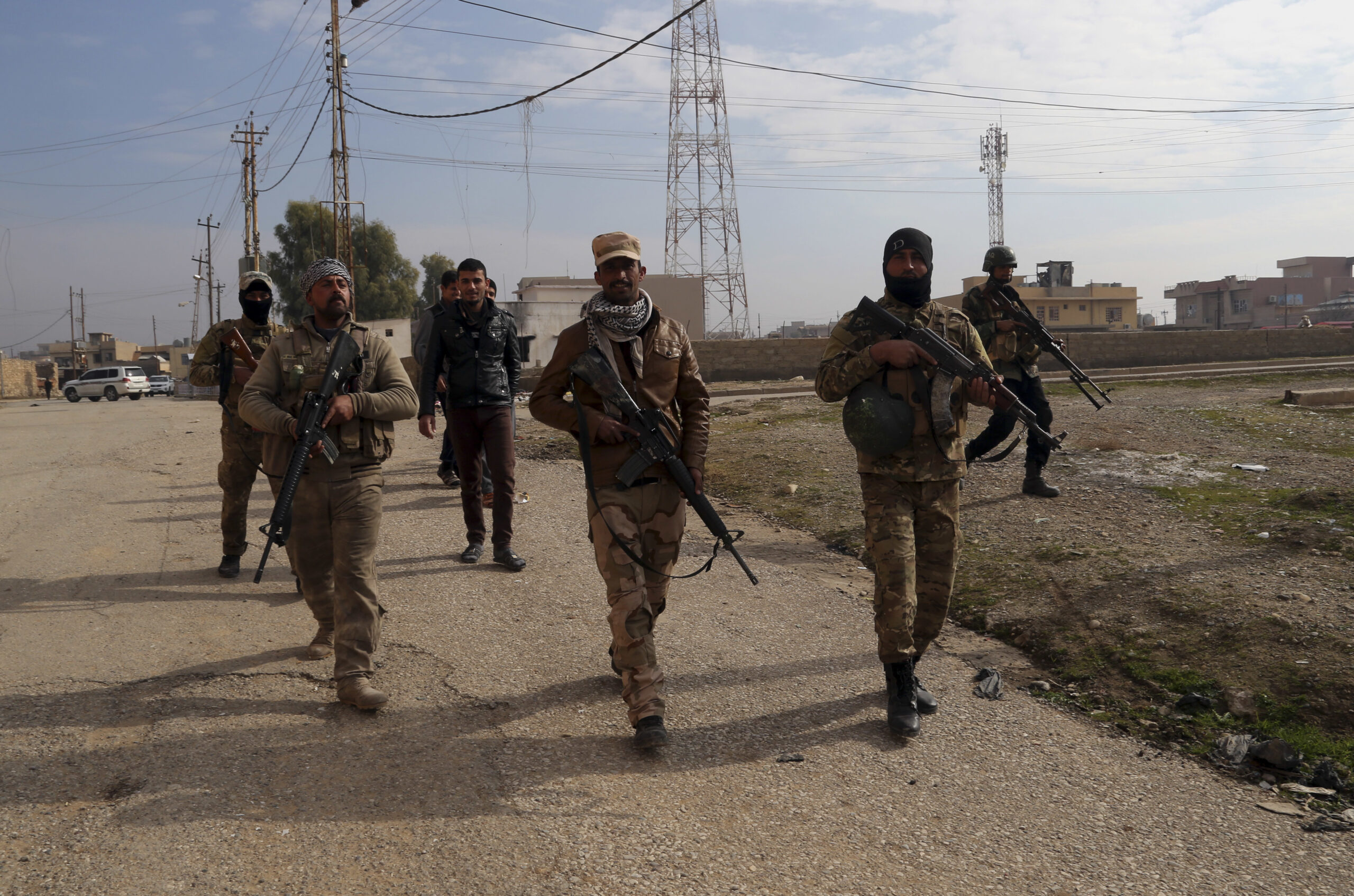 Iraqi security forces patrol in an area recently liberated from Islamic State in the predominantly Christian town of Tilkaif, Iraq, Saturday, Jan. 21, 2017. (AP Photo/Khalid Mohammed) (AP)