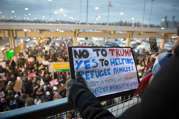 Protesters gather at JFK International Airport against Donald Trump's executive order on January 28, 2017 in New York. (Getty/Bryan R. Smith)