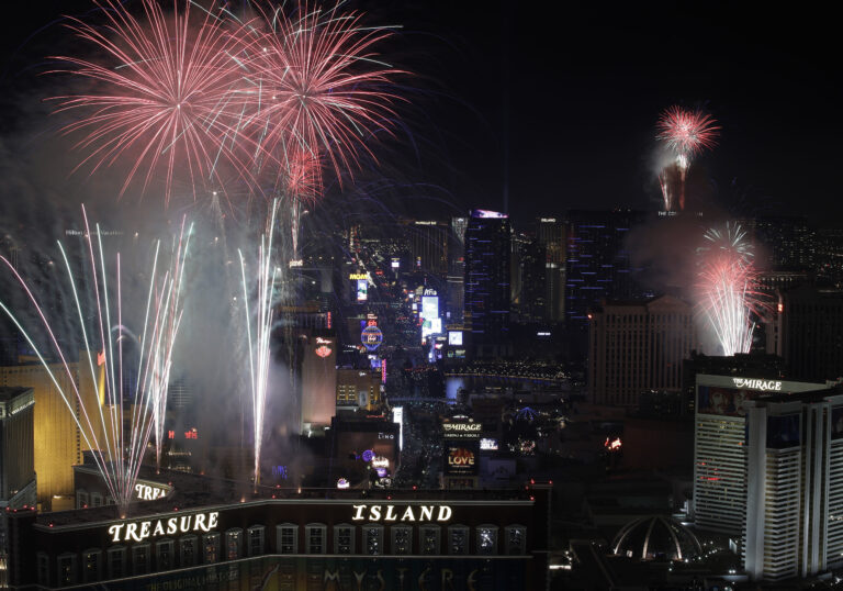 Fireworks explode over the Las Vegas Strip during a New Year's Eve celebration Sunday, Jan. 1, 2017, in Las Vegas. (AP Photo/John Locher) (AP)