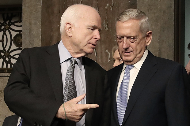 John McCain stands with Defense Secretary nominee James Mattis, January 12, 2017. (Getty/Mark Wilson)