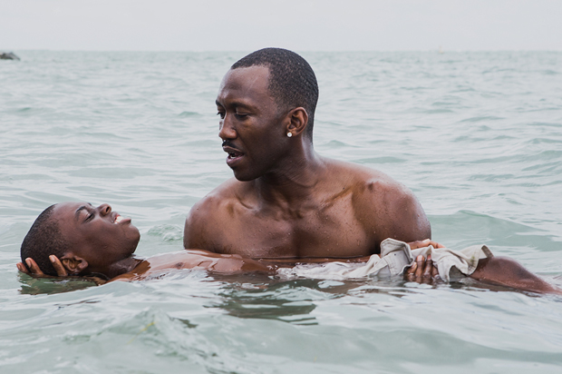 Mahershala Ali and Alex R. Hibbert in "Moonlight" (A24)