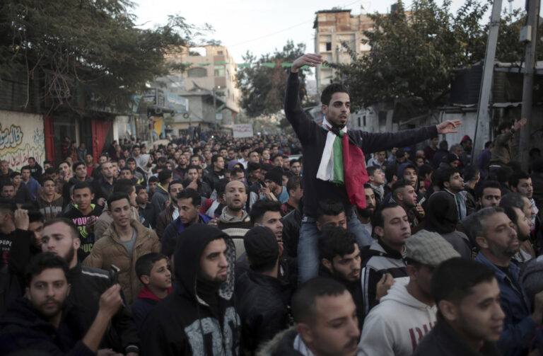 Palestinians chant slogans during a demonstration against the chronic power cuts in Jabaliya refugee camp, Northern Gaza Strip, Thursday, Jan. 12, 2017.  (AP Photo/ Khalil Hamra) (AP)