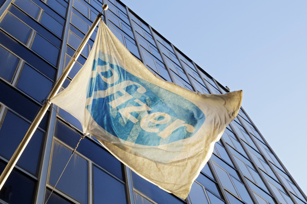 FILE - In this Monday, Nov. 23, 2015, file photo, the Pfizer flag flies in front of world headquarters in New York. On Wednesday, Aug. 24, 2016, drugmaker Pfizer said it's buying rights to Anglo-Swedish drugmaker AstraZeneca PLC's portfolio of approved and experimental antibiotic and antifungal pills, a move to boost Pfizer's business in one of its priority areas. The deal is valued in excess of $1.5 billion, including rights to sell the medicines in most countries outside the U.S., royalties and other payments. (AP Photo/Mark Lennihan, File) (AP/Mark Lennihan)