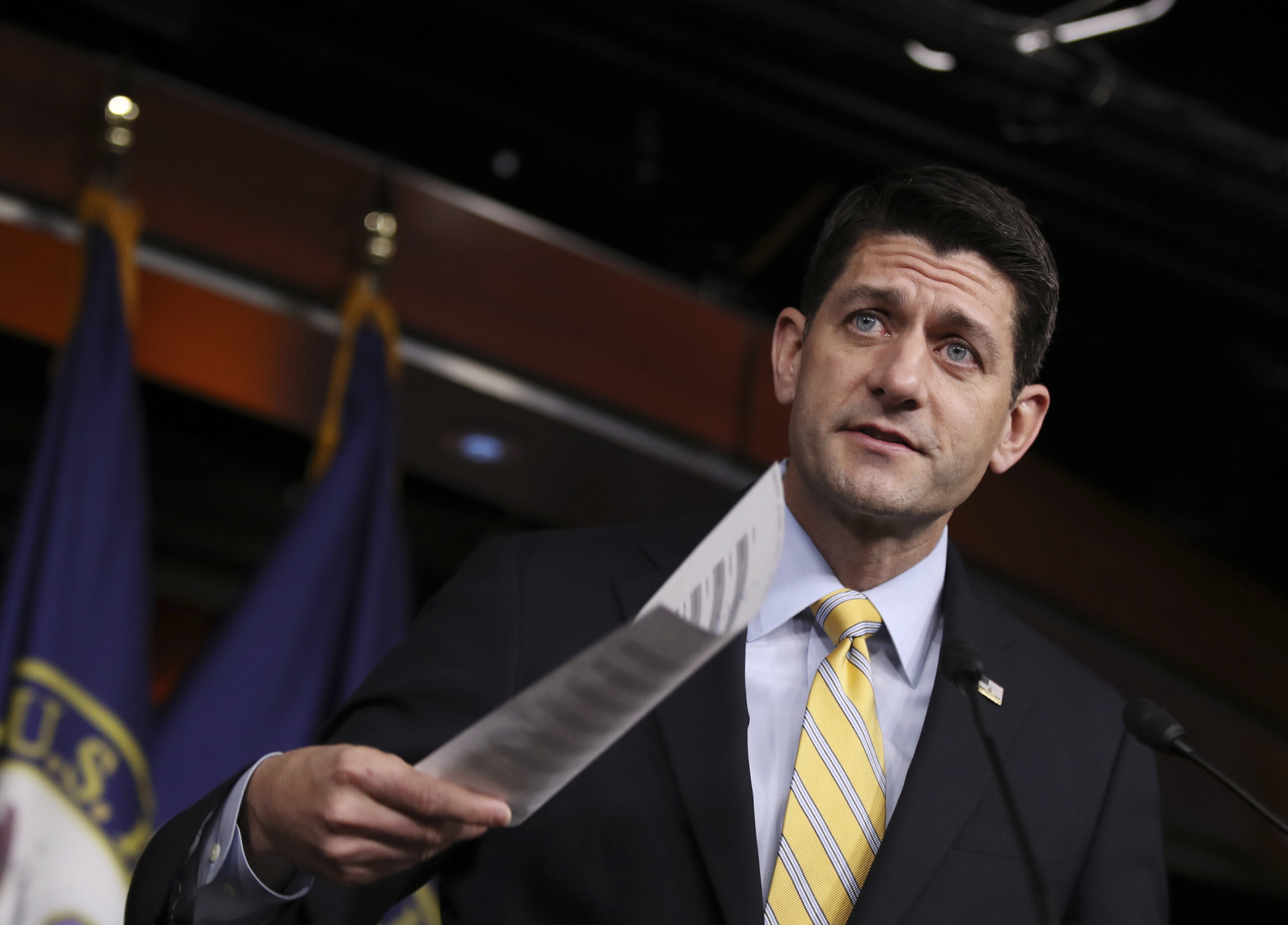 House Speaker Paul Ryan of Wis. holds his copy of insurance premium statistics during a news conference on Capitol Hill in Washington, Thursday, Jan. 5, 2017. (AP Photo/Manuel Balce Ceneta) (AP)