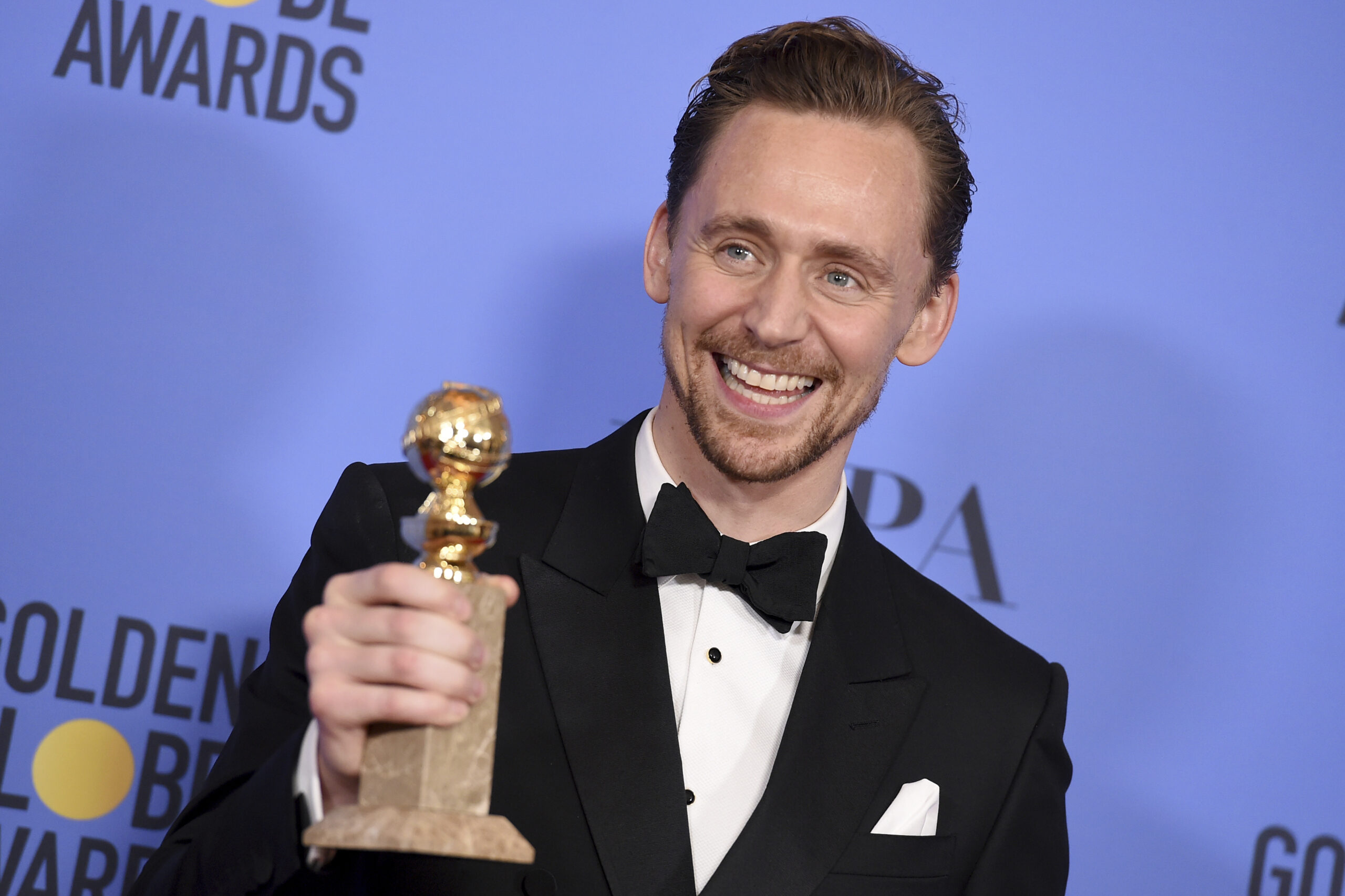 Tom Hiddleston poses in the press room with the award for best performance by an actor in a limited series or a motion picture made for television for "The Night Manager" at the 74th annual Golden Globe Awards at the Beverly Hilton Hotel on Sunday, Jan. 8, 2017, in Beverly Hills, Calif. (Photo by Jordan Strauss/Invision/AP) (Jordan Strauss/invision/ap)
