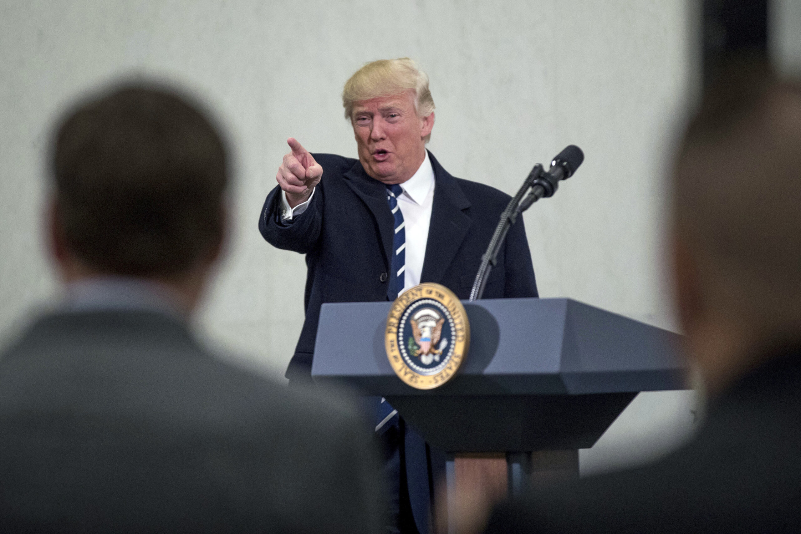 President Donald Trump points to a member of the audience after speaking at the Central Intelligence Agency in Langley, Va., Saturday, Jan. 21, 2017. (AP Photo/Andrew Harnik) (AP)