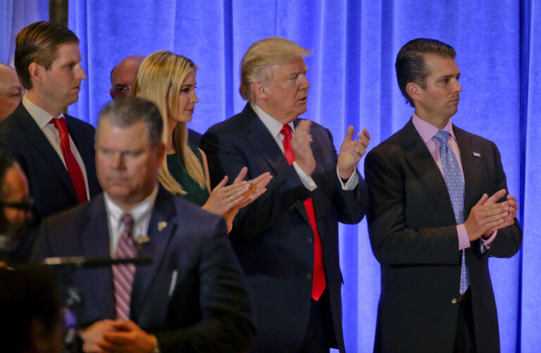 President-elect Donald Trump waits with family members Eric Trump, left, Ivanka Trump and Donald Trump Jr. before speaking at a news conference, Wednesday, Jan. 11, 2017, in New York. The news conference was his first as President-elect. (AP Photo/Seth Wenig) (AP)