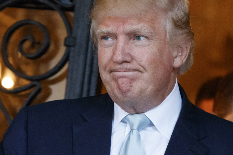 FILE - In this Dec. 28, 2016 file photo, President-elect Donald Trump talks to reporters at Mar-a-Lago in Palm Beach, Fla. (AP Photo/Evan Vucci) (AP)
