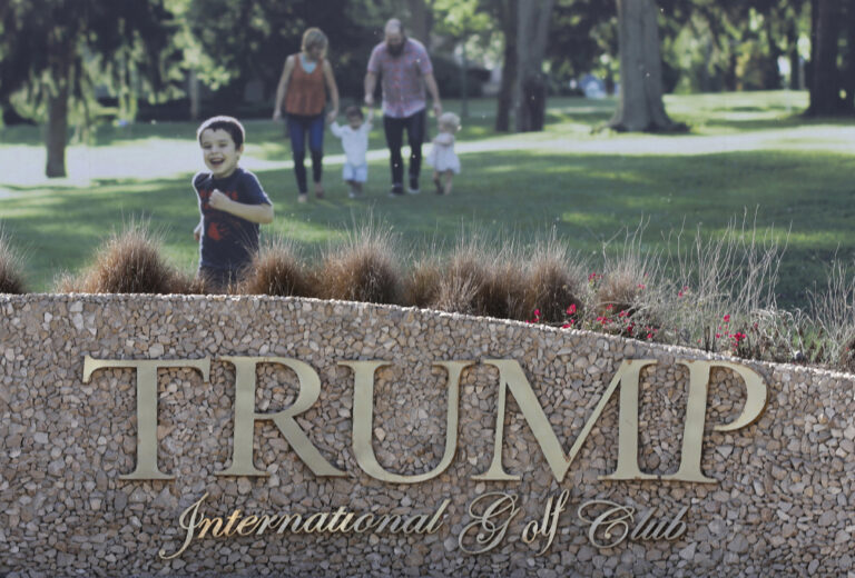 FILE- In this Tuesday, Dec. 20, 2016 file photo, a general view with an advertising billboard is seen at the Trump International Golf Club main entrance in Dubai, United Arab Emirates. Dubai's DAMAC Properties tells The Associated Press it offered deals to U.S. President-elect Donald Trump's firm worth some $2 billion, but the Trump Organization turned them down. (AP Photo/Kamran Jebreili, File) (AP)