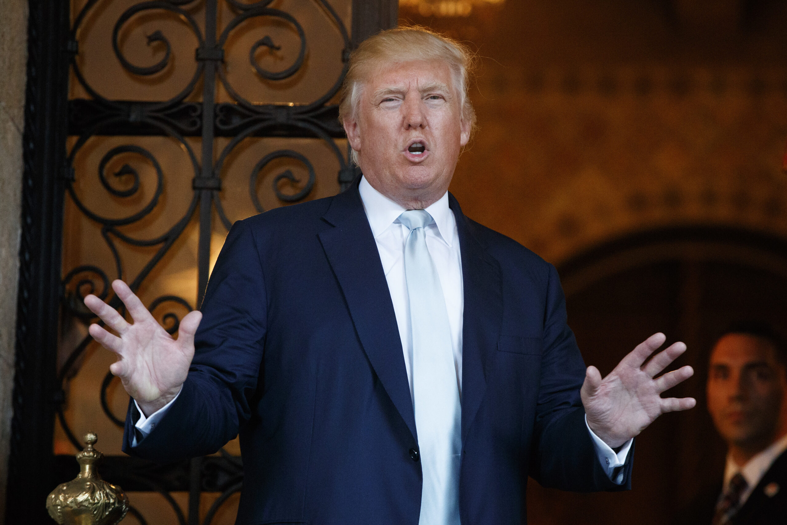 FILE - In this Dec. 28, 2016 file photo, President-elect Donald Trump speaks to reporters at Mar-a-Lago in Palm Beach, Fla. Trump challenges U.S. intelligence agencies to provide decisive evidence of Russian involvement in election-season hacking. Ahead of a highly anticipated congressional hearing, Trump is exploiting some Americans’ skepticism and undercutting officials he will soon rely on. (AP Photo/Evan Vucci, File) (AP)