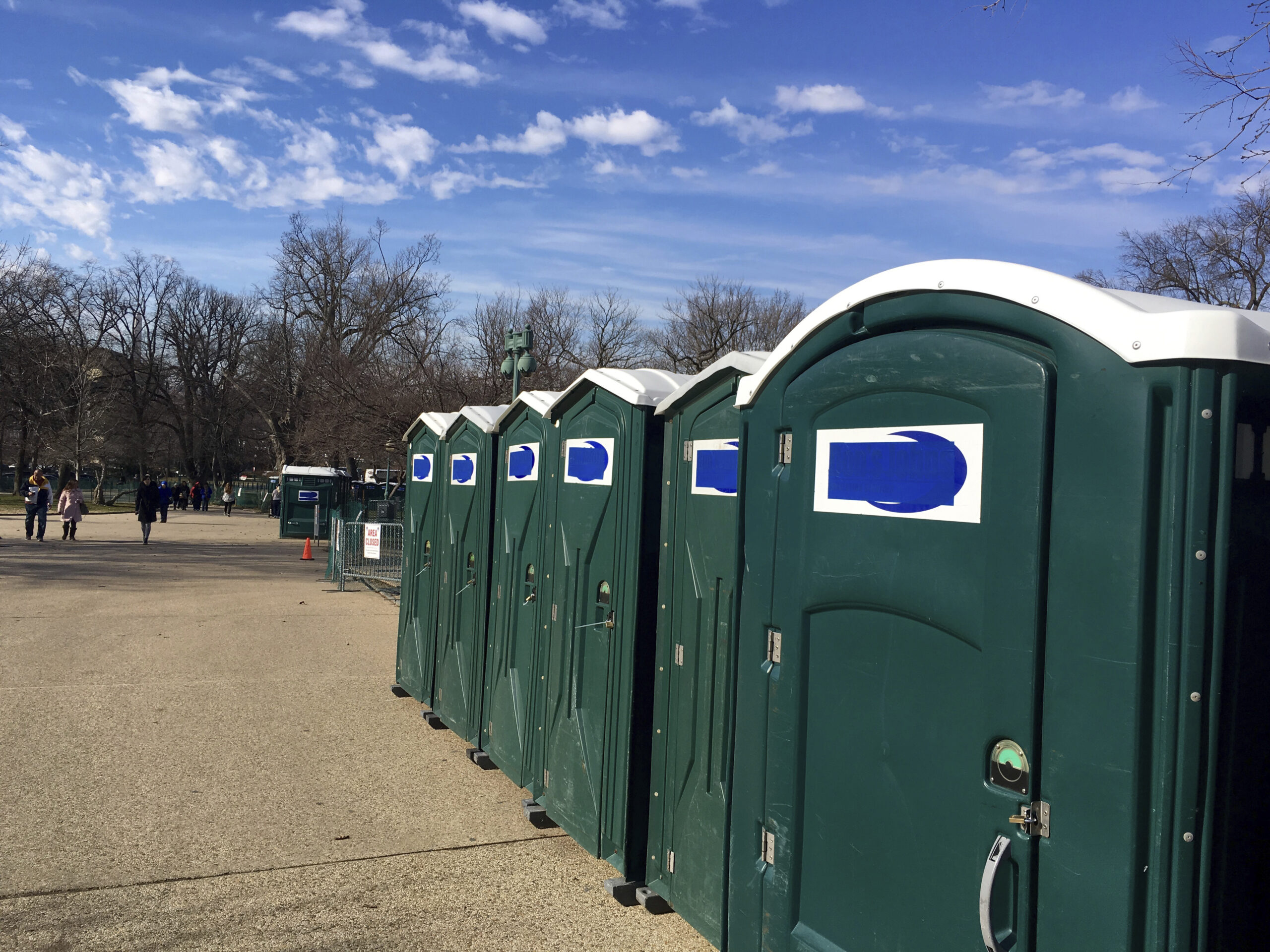 A row of portable restrooms, with the name “Don’s Johns” covered up, is seen on Capitol Hill in Washington, Friday, Jan. 13, 2017. Virginia-based Don’s Johns calls itself the Washington area’s top provider of portable toilet rentals, but the name apparently strikes too close to home for inaugural organizers. Workers have placed blue tape over the brand name on dozens of portable restrooms installed near the Capitol for the inauguration. (AP Photo/Matthew Daly) (AP)