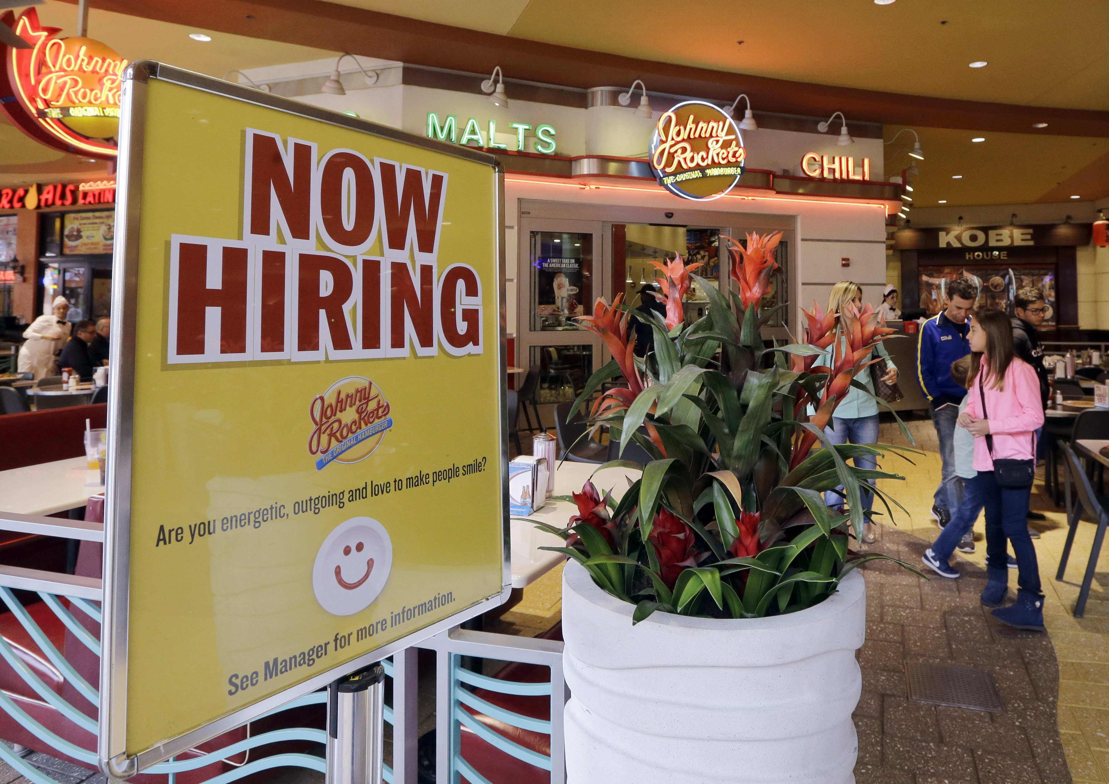 FILE - In this Tuesday, Feb. 9, 2016, file photo, a restaurant posts a sign indicating they are hiring, in Miami. (AP Photo/Alan Diaz, File) (AP)