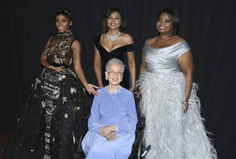 Janelle Monae, from left, Taraji P. Henson, and Octavia Spencer pose with Katherine Johnson, seated, backstage at the Oscars on Sunday, Feb. 26, 2017, at the Dolby Theatre in Los Angeles. (Matt Sayles/Invision/AP)