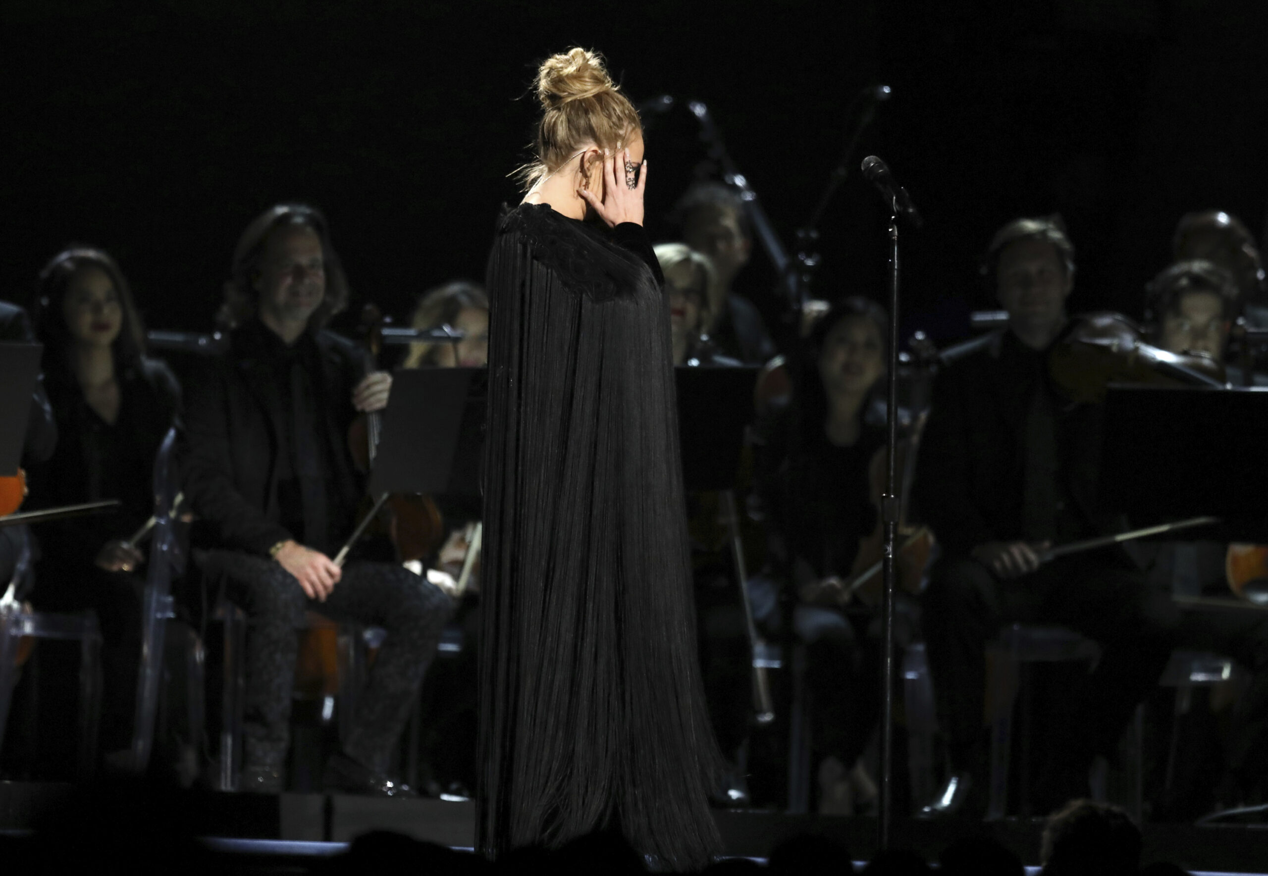 Adele reacts before restarting a performance tribute to George Michael at the 59th annual Grammy Awards on Sunday, Feb. 12, 2017, in Los Angeles. (Matt Sayles/invision/ap)