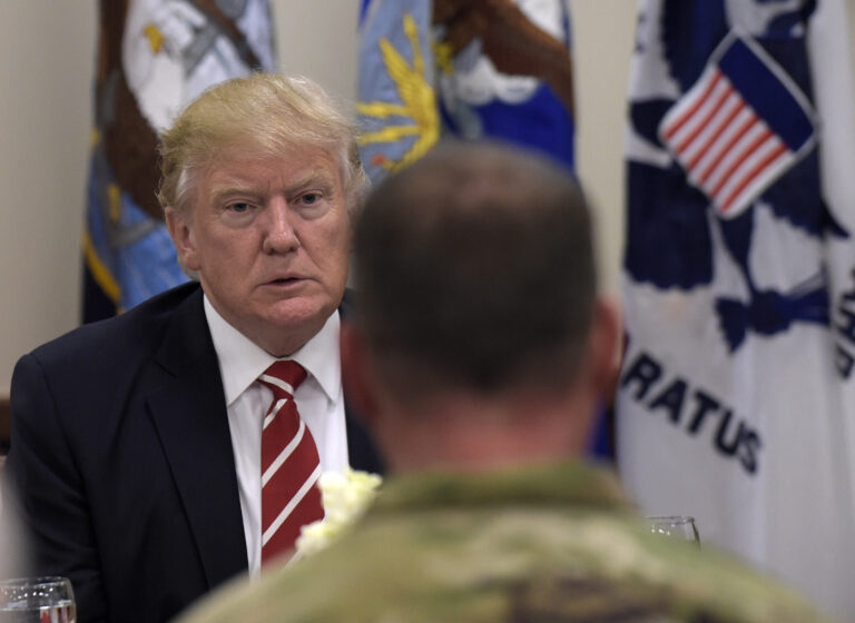 President Donald Trump has lunch with troops while visiting U.S. Central Command and U.S. Special Operations Command at MacDill Air Force Base, Fla., Monday, Feb. 6, 2017. Trump, who spent the weekend at Mar-a-Lago, stopped for a visit to the headquarters before returning to Washington. (AP Photo/Susan Walsh) (AP)