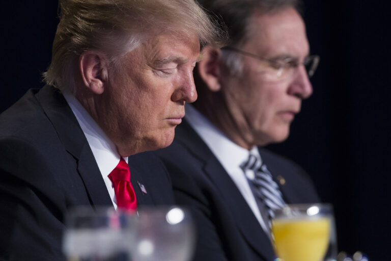 FILE - In this Feb. 2, 2017, file photo, President Donald Trump and Sen. John Boozman, R-Ark., pause during the National Prayer Breakfast in Washington. When Trump spoke to the National Prayer Breakfast this month, he underscored his vow to defend the religious rights of the conservative Christians who helped propel him to power. (AP Photo/Evan Vucci, File) (AP)