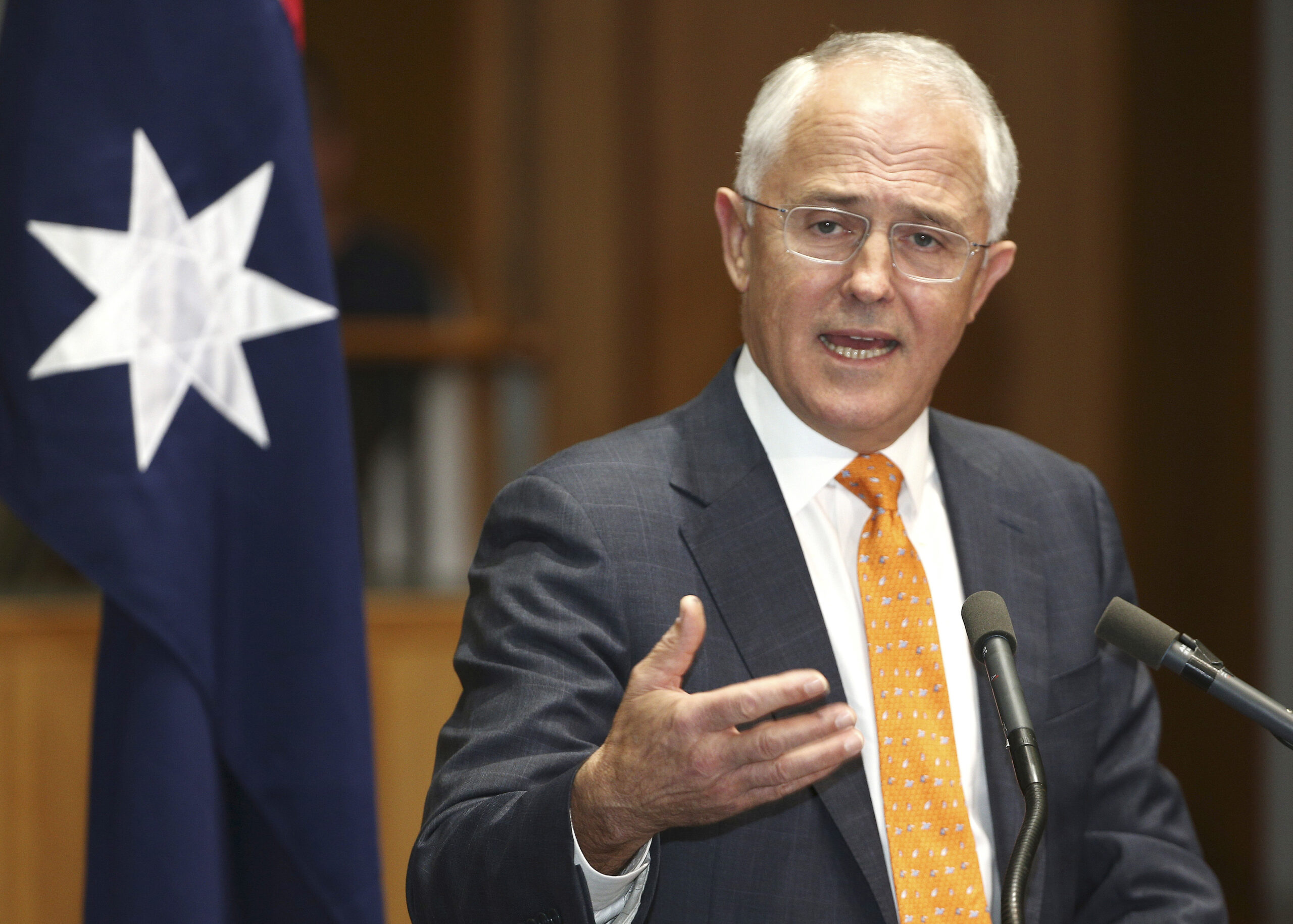 FILE - In this May 8, 2016 file photo, Australian Prime Minister Malcolm Turnbull speaks to the media during a press conference at Parliament House in Canberra, Australia. Turnbull said Wednesday, Feb. 1, 2017 that U.S.  President Donald Trump had agreed during a weekend telephone conversation to keep an Obama administration promise to resettle an undisclosed number of mostly Muslim refugees held on the impoverished nations of Nauru and Papua New Guinea. (AP Photo/Rob Griffith, File) (AP)