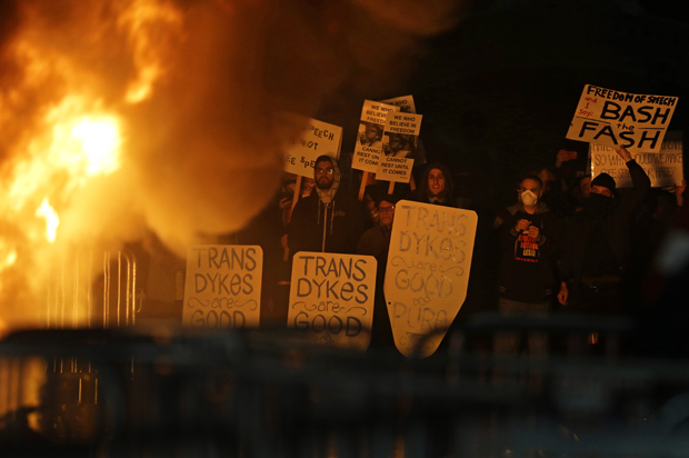 Protestors watch a fire on Sproul Plaza during a rally against the scheduled speaking appearance by Breitbart News editor Milo Yiannopoulos on the University of California at Berkeley campus on Wednesday, Feb. 1, 2017 (AP/Ben Margot)
