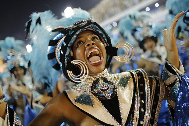 A performer from the Vila Isabel samba school parades during Carnival celebrations at the Sambadrome in Rio de Janeiro, Brazil, Monday, Feb. 27, 2017. (AP Photo/Silvia Izquierdo) (AP)