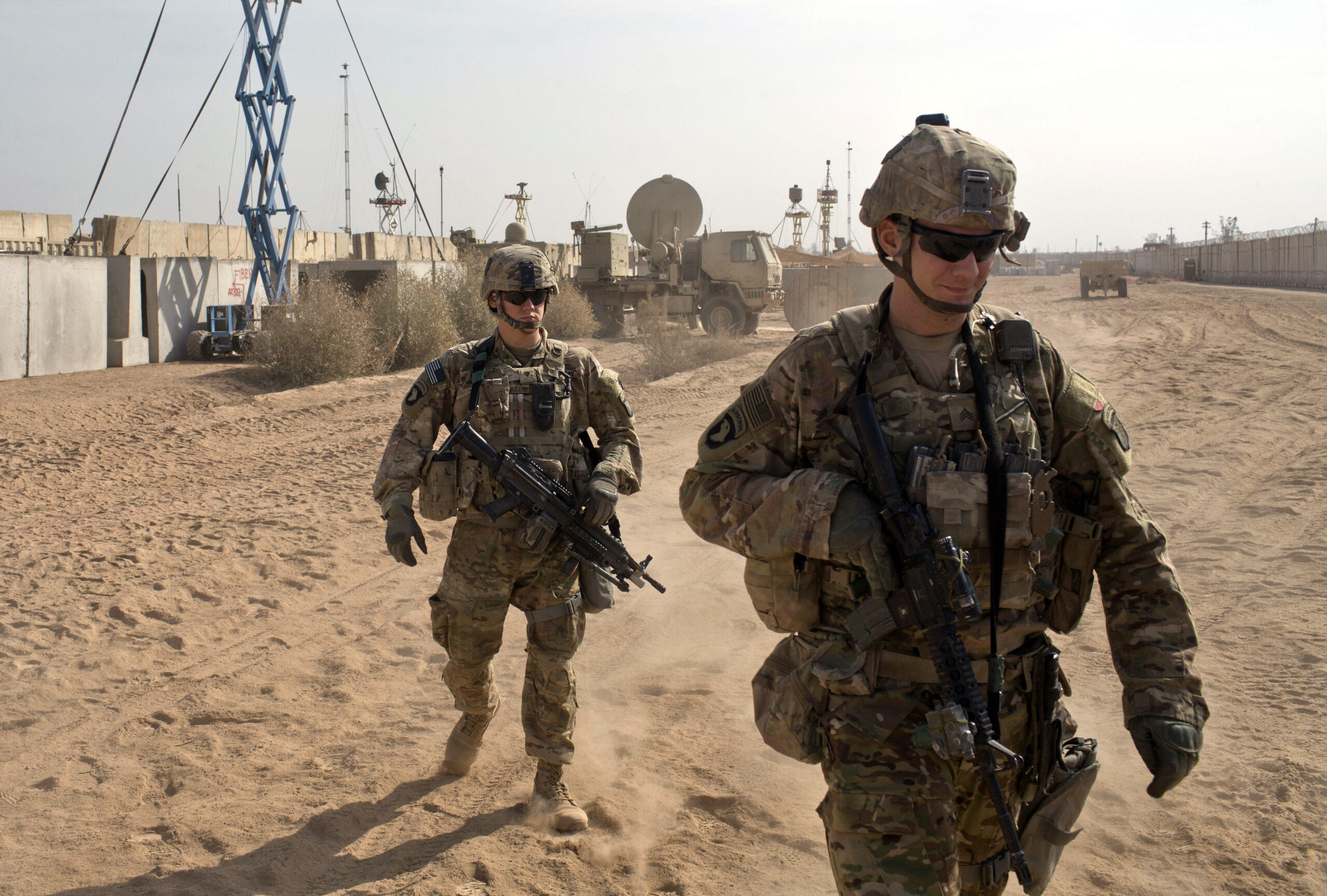 FILE - In this Nov. 9, 2016 file photo, U.S. Army soldiers move through Qayara West Coalition base in Qayara, some 50 kilometers south of Mosul, Iraq. Reverberations from President Donald Trump’s travel ban and other stances are threatening to undermine future U.S.-Iraqi security cooperation, rattling a key alliance that over the past two years has slowly beaten back the Islamic State group. Iraq’s prime minister, Haider al-Abadi, has sought to contain public anger sparked by the ban and by Trump’s repeated statements that the Americans should have taken Iraq’s oil, as well as his hard line against Iran, a close ally of Baghdad. (AP Photo/Marko Drobnjakovic, File) (AP)
