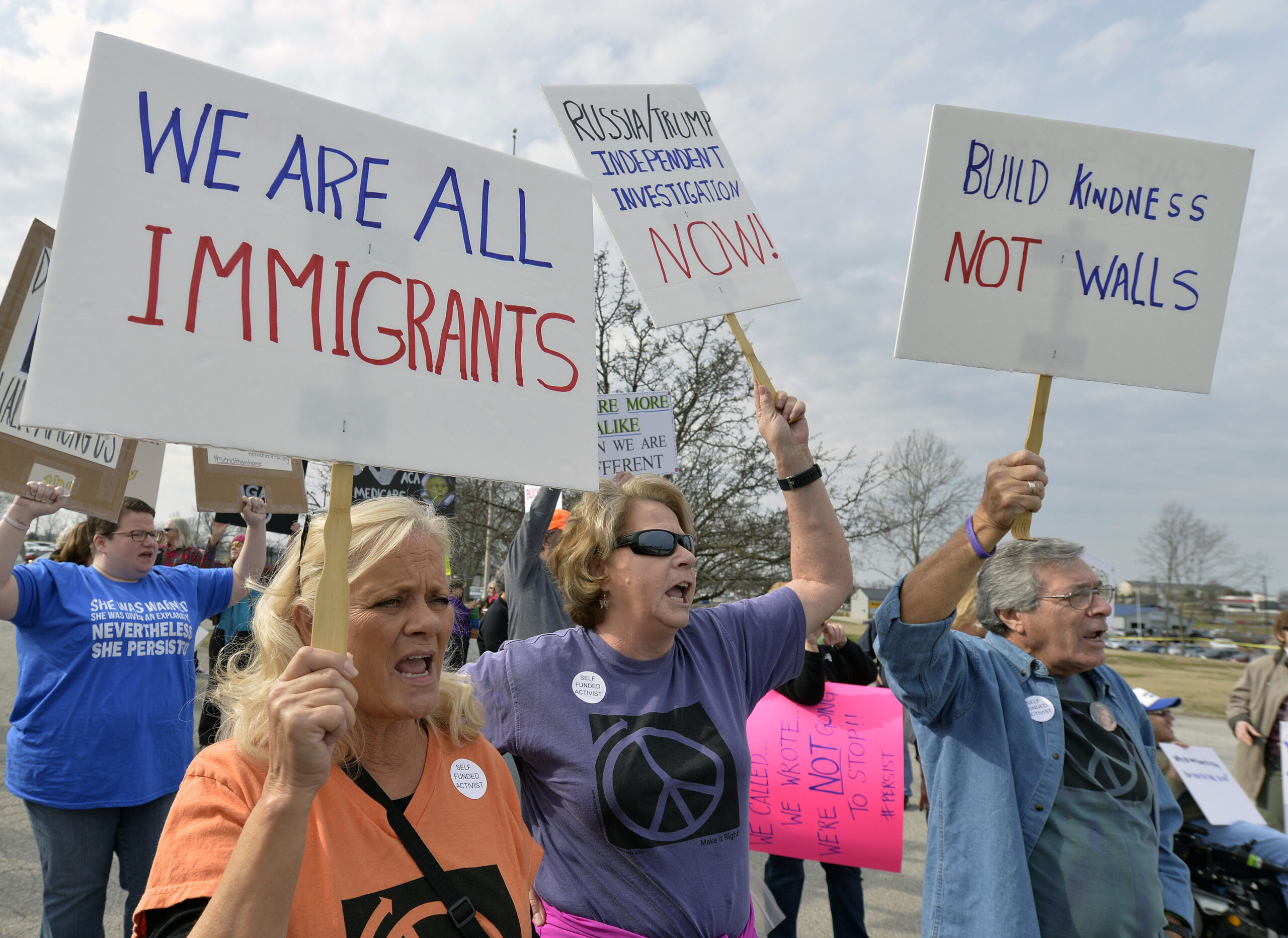 A group numbering in the hundreds gather outside the American Legion Post 34 to protest the appearance of Senate Majority Leader Mitch McConnell R-Ky., and the policies of the Trump administration Tuesday, Feb. 21, 2017, in Lawrenceburg, Ky. () (AP Photo/Timothy D. Easley)
