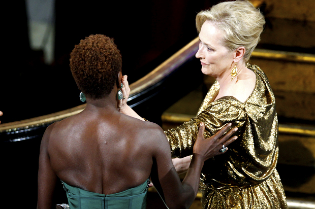 Meryl Streep, winner of the Oscar for best actress for her role in "The Iron Lady" is congratulated by fellow nominee Viola Davis (Reuters/Gary Hershorn)