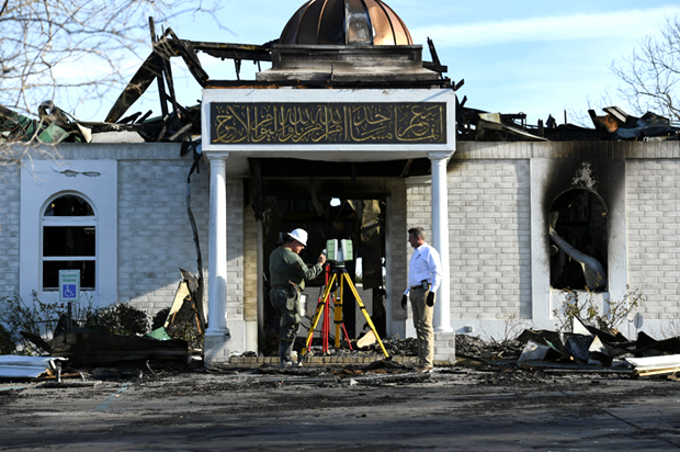 Security officials investigate the aftermath of a fire at the Victoria Islamic Center mosque in Victoria, Texas (Reuters/Mohammad Khursheed)