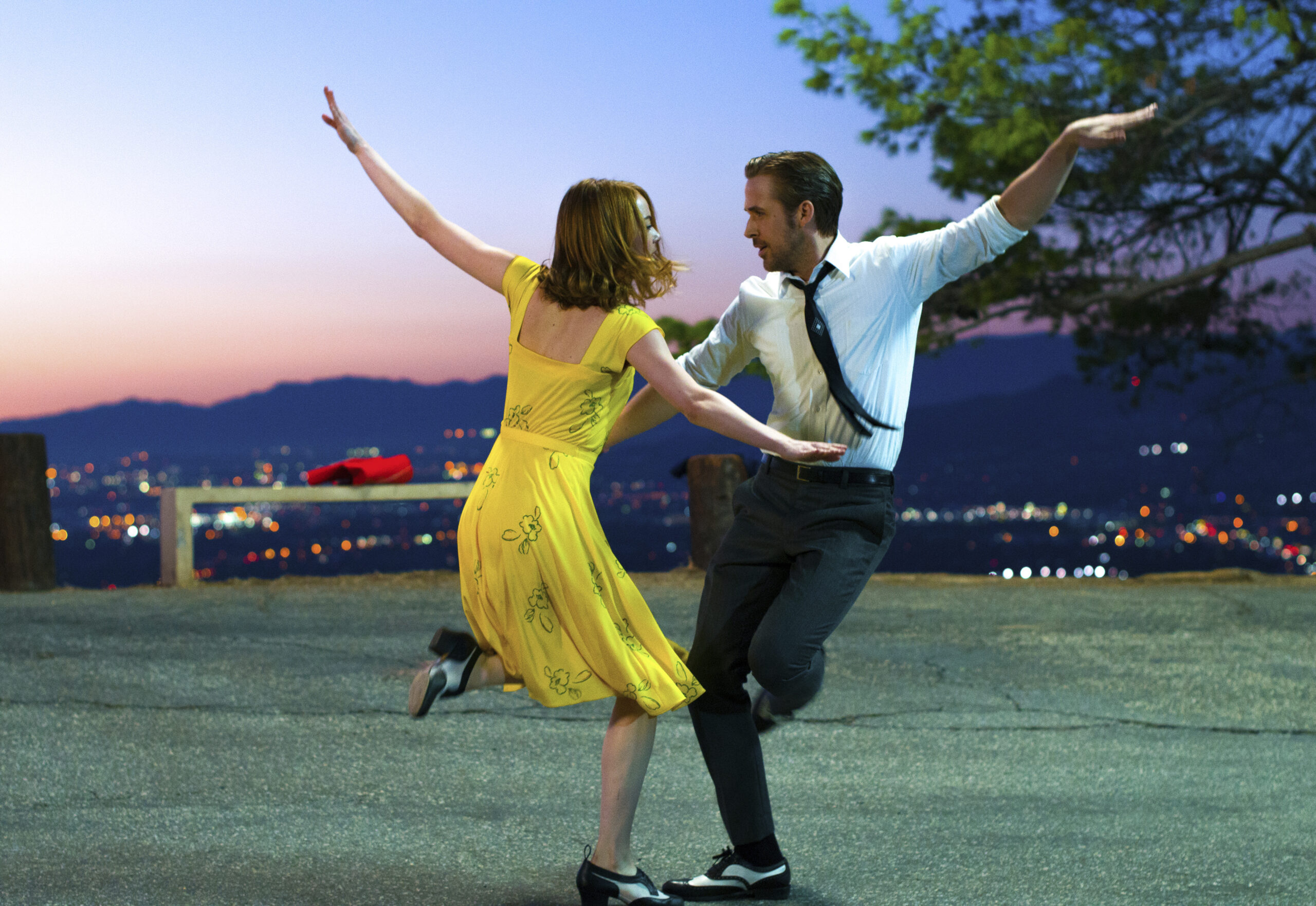 This image released by Lionsgate shows Ryan Gosling, right, and Emma Stone in a scene from, "La La Land." The film is nominated for an Oscar for best picture. The 89th Academy Awards will take place on Feb. 26. (Dale Robinette/Lionsgate via AP) (AP)