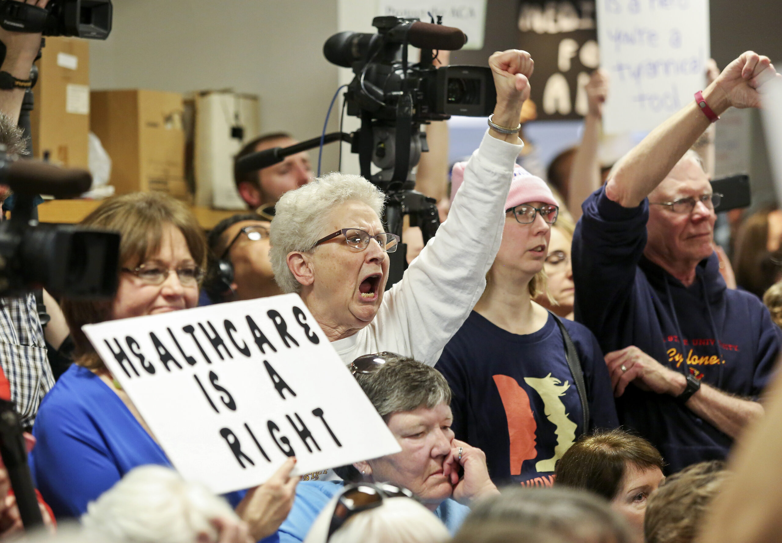 Cleone Hermsen, of Carroll, Iowa, expresses her criticism while listening to Sen. Joni Ernst, R-Iowa, during a veterans roundtable event at Maquoketa City Hall on Tuesday, Feb. 21, 2017, in Maquoketa, Iowa. Iowa’s U.S. senators were met Tuesday with overflow crowds who pointedly questioned them about President Donald Trump’s actions during his first month in office and other issues. Although Republican Sens. Charles Grassley and Ernst held meetings in small towns in northern and eastern Iowa, they drew big crowds. (Nicki Kohl/Telegraph Herald via AP) (AP)
