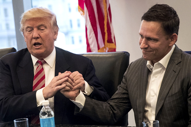 Donald Trump shakes the hand of Peter Thiel (Getty/Drew Angerer)