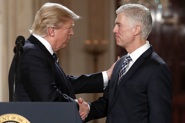 Donald Trump shakes hands with Neil Gorsuch, his choice for Supreme Court Justice, at the White House, Jan. 31, 2017. (AP/Carolyn Kaster)